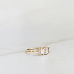 Timeless Everyday Ring With Prong Setting, Everyday White Gold Rings With Emerald Cut, Everyday White Gold Emerald Cut Ring, Everyday White Rings With Prong Setting, 14k White Gold Baguette Cut Ring, 14k Gold Rings With Emerald Cut For Everyday, Minimalist Vs Clarity Baguette Cut Ring, 14k Gold Emerald Cut Rings For Everyday, Everyday 14k Gold Emerald Cut Rings