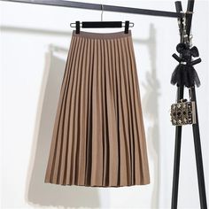 Grab this simple yet elegant Retro Slim Pleated Mid-Length Skirt For Women and expand your collection of skirts in your closet. The solid-colored skirts are available in several different colors which opens various options to buy from. The high-quality chiffon makes this skirt very light and comfortable. High Waist Long Skirt, High Waisted Pleated Skirt, High Rise Skirt, Pleated Long Skirt, Fall Wardrobe Essentials, Skirt High Waist, Women Skirt, Skirt Summer, Long Skirts For Women