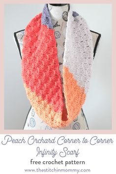 two crocheted scarves are hanging on a mannequin's head