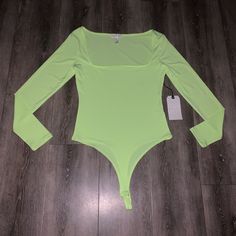 New Leith Neon Green Bodysuit Size M #20 Fitted Green Bodysuit, Green Fitted One-piece Bodysuit, Fitted Green One-piece Bodysuit, Green Long Sleeve Bodysuit For Summer, Fitted Green Bodysuit For Night Out, Green Stretch Bodysuit For Spring, Black Bodysuit Longsleeve, Green Bodysuit, Black Ballerina