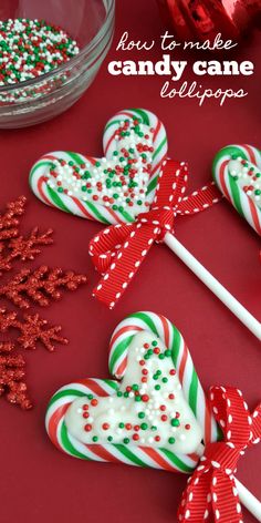 some candy canes are on a red table