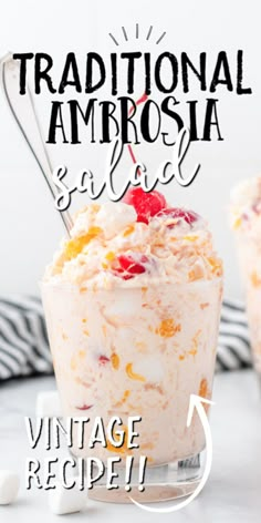 a close up of a dessert in a glass on a table with the words traditional ambrosia salad above it