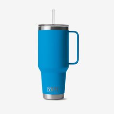 a blue yeti cup with a straw sticking out of it