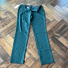 -Designer = Hugo Boss -Size= 8. Trunk 49 - Msrp = $278 -Color = Green -Style= Titana5. Hugo Boss Size 8 Titana5 Textured Green Unhemmed Plain Front Trouser -Inseam = Measured At Seam Of Crotch 5downwards To Bottom Tip Of Jeans/Pants = Approximately 88.5cm -Rise = Measured At Seam Of Crotch Upwards To Tip Of Front Of Waist Line= Approximately 24cm -Waist Circumference = Measured At Seam Of Point Where Waist Fly Edge Meets All Arotund To Same Point When Buttoned = Approximately 92cm -Genuine And A Green Mid-rise Pants For Work, Formal Stretch Green Pants, Fitted Green Pants, Green Slim Fit Bottoms For Work, Green Tapered Leg Elastane Pants, Green Slim Fit Workwear Pants, Green Slim Fit Pants For Work, Fitted Green Pants For Business Casual, Green Straight Leg Fitted Pants