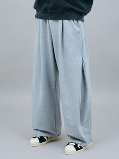 Composition : Cotton 65%, Polyester 35%Country of Origin : Republic of Korea Oversized Wide Leg Sweatpants For Spring, Baggy Solid Color Bottoms For Loungewear, Oversized Solid Cotton Bottoms, Oversized Solid Color Bottoms With Pockets, Solid Color Oversized Wide-leg Bottoms, Oversized Solid Wide Leg Bottoms, Baggy Loungewear Bottoms, Solid Oversized Wide Leg Bottoms, Oversized Solid Color Straight Leg Pants