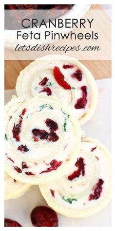 cranberry feta pinwheels with cream cheese and dried cherries in the background