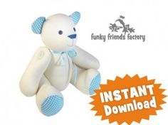 a white teddy bear sitting on top of a book cover with an orange and blue ribbon around it's neck