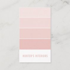 a pink and white business card with the words hunter's interiors on it in red