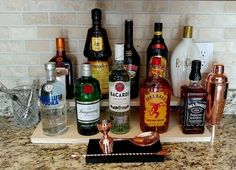 there are many different types of liquor on the counter