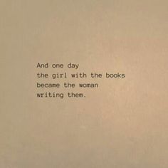 an old typewriter with the words and one day, the girl with the books become the woman writing them