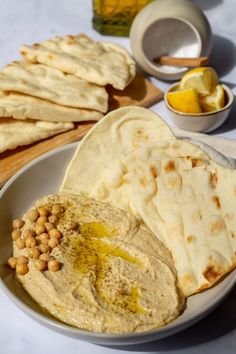 pita bread with chickpeas and lemons on the side