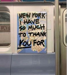 a sign that is on the side of a subway car saying, new york i have so much to thank you for