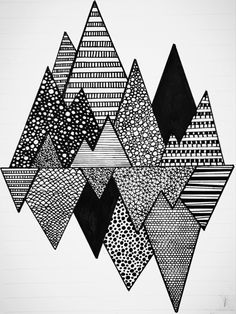 black and white drawing of triangles on paper