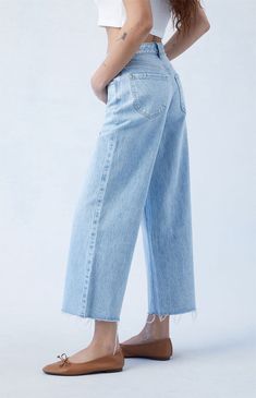 The Light Indigo Cropped Wide Leg Jeans from PacSun is a new classic you're gonna wanna cop now. These classic high-rise jeans get updated with a wide-leg fit for added comfort, a raw-cut hem, and a cropped length. 


	Model is wearing a size 26
	Model measurements: 5’6.5” height, 32” bust, 25” waist, 38” hip


Learn more about PacSun eco items