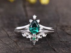 Pear shaped Emerald Rings,Unique Engagement Ring Set,Diamond Wedding Band,Curved Wedding Band,Women Promise Bridal Ring,vintage inspired,victorian jewelry Oval Emerald Engagement ring Set: https://www.etsy.com/listing/683456572/art-deco-emerald-engagement-ring Opal wedding ring set: https://www.etsy.com/listing/755472030/opal-engagement-ring-rose-gold ITEM DESCRIPTION Emerald Engagement Ring: ✦5x7mm Pear Cut Lab created emerald ✦0.07ctw round cut natural SI/H Diamonds or moissanite stones ✦Band Opal Wedding Ring Set, Emerald Engagement Ring Green, Emerald Engagement Ring Set, Emerald Ring Vintage, Diamond Bridal Ring Sets, Opal Wedding Rings, Diamond Wedding Rings Sets, Bridal Engagement Rings, Etsy Wedding Rings