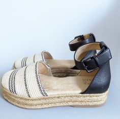 Naturalizer Waverly Women's Sandals Brand New Size: 8m Color: Tan, Black Strap Show Closure: Ankle Strap Heel Height: 1.5 Inches Material: Fabric And Synthetic Comfortable Black Espadrilles For Summer, Black Summer Espadrilles With Woven Sole, Black Closed Toe Summer Espadrilles, Adjustable Round Toe Summer Espadrilles, Summer Adjustable Round Toe Espadrilles, Summer Adjustable Espadrilles With Round Toe, Adjustable Summer Espadrilles With Round Toe, Adjustable Black Espadrilles For Vacation, Black Adjustable Espadrilles For Vacation