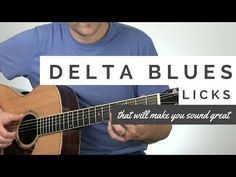 a man playing a guitar with the words delta blues licks