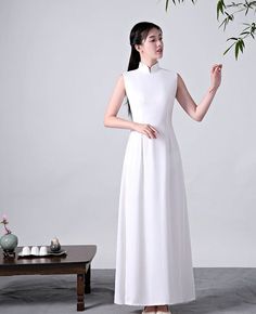 Plain pattern, chiffon fabric long Ao dai#qipaodress #chinesedress#cheongsamdress#modernqipao#moderncheongsam Elegant Long Cheongsam For Summer, Elegant Long Summer Cheongsam, Elegant Long Ao Dai For Summer, Elegant Fitted Ao Dai For Tea Ceremony, Elegant Full-length Ao Dai For Summer, Elegant Long White Ao Dai, Qipao Black, White Cheongsam, Black Cheongsam