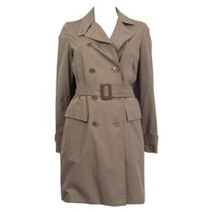 100% authentic Loro Piana double breasted trench coat in khaki polyester (80%) and polyurethane (20%). Features a belt, two flap pockets and one slit pocket on the front. Has buttoned cuffs and a notch collar. Opens with four khaki buttons on the front. Lined in khaki cashmere (100%). Has a small light stain on the front otherwise in excellent condition. Measurements Tag Size 40 Size S Shoulder Width 39cm (15.2in) Bust 90cm (35.1in) to 104cm (40.6in) Waist 80cm (31.2in) to 92cm (35.9in) Hips 98cm (38.2in) to 120cm (46.8in) Length 91cm (35.5in) Sleeve Length 60cm (23.4in) All our listings include only the listed item unless otherwise specified in the description above. Double Breasted Trench Coat, Trench Jacket, Notch Collar, Loro Piana, Small Light, Outerwear Coats, Double Breasted, Milan, Trench Coat