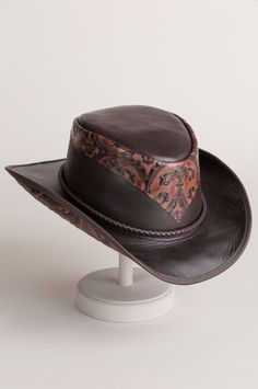 Falcon Hand-Tooled Leather Cowboy Hat | Overland Fitted Leather Hat With Curved Brim, Fitted Leather Top Hat With Short Brim, Fitted Leather Hat With Short Brim, Fitted Leather Top Hat With Flat Brim, Black Leather Hat With High Crown, Western Hats With Leather Lining And Flat Brim, Adjustable Curved Brim Hat With Leather Lining, Adjustable Hat With Leather Lining And Curved Brim, Western Style Leather Hat With Short Brim