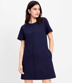 Done in a sleek and stretchy soft knit ponte, this shift dress is a study in modern-minimalist perfection. Round neck. Short sleeves. Front button patch pockets. Back zip.,Imported:Imported,Fit:Fit: Shift - fits straight and relaxed,Length:33 1/4" from top back neck to hem, measured from a size 8/M,Fabrication:66% Rayon 29% Nylon 5% Span,Garment Care:Machine Washable Loft Ponte Pocket Mini Dress Size XS Deep Space Blue Women's by Loft Size Regular - XS Deep Space Blue Women's Shift, Dresses, 66%, Rayon, 29%, Nylon, 5%, Span, Machine, Washable