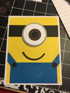 a paper cut out of a minion