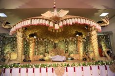 an elaborate stage set up for a wedding ceremony