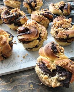 several pastries sitting on top of a metal tray