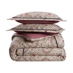 three pillows stacked on top of each other