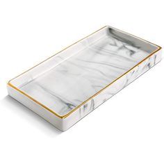 a marble tray with gold trimmings on the edges and bottom, sitting on a white surface