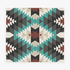 an abstract pattern with brown, blue and green colors