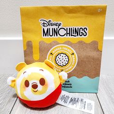 a stuffed animal next to a bag of munchlings