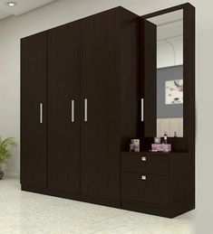 a room with a large mirror and some brown cupboards in front of the wall