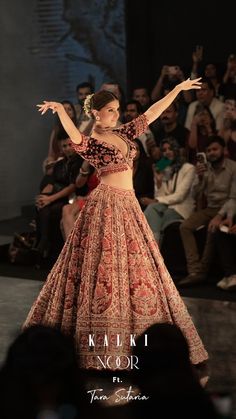 A Perfect Show. 💖  It was a sweet treat to watch the beauty on the ramp in the most amazing charmistic lehengas of the couture. Our showstopper took over the stage with sheer grace and love!  The most amazing Tara Sutaria 💃  Is giving us major cues on how to slay this shaadi season in our NOOR Couture.  Our pretty show stopper added all the beauty and grace to our dark red lehenga. ✨  From manifesting perfect Bridal lehengas to the luxurious bridal couture.  This collection speaks elegance in itself, these  masterpieces will steal hearts.  Tag all the Brides-To-Be to check out the most amazing bridal collection for the shaadi season. 💁🏻‍♀️  .  #KALKI #Kalkifashion #KALKlxTaraSutaria #KALKINoor Dark Red Lehenga, Tara Sutaria, Simple Lehenga