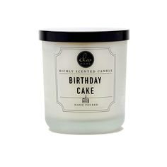 a birthday cake candle sitting on top of a white table