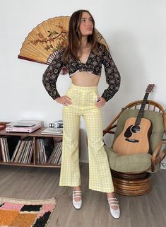 Pretty polyester gingham trousers from the 70s! Cute and summery country, hippie vibes. The color and gingham print of these make me happy In great condition, a little bit of a loose seam on the seat, not a big deal.  Measurements: Waist: 24" Hips: 35"-36" Inseam: 29" Length: 40" Model's measurements: 5'8" 34'' bust, 22'' waist, 35.5'' hips Gingham Trousers, 70s Jeans, Yellow Gingham, Womens Trousers, Hippie Vibes, Suede Dress, Gingham Print, Flare Pants, Vintage 70s