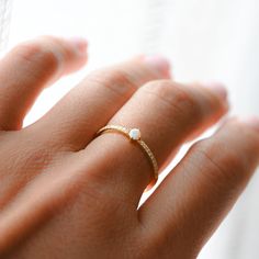 Delicate opal ring, that is perfect for stacking or wearing alone. A true beauty and must have! Sweet, simple, and dainty ring. Perfect for a minimalist look. ☆ Details ☆ * Made of 925 Sterling Silver * Available in 14k Gold Plating, Rose Gold Plating or Rhodium Plated * We use a THICK, DURABLE 14k GOLD plating - for a piece that will last you years to come! * VERY HIGH QUALITY * Available in sizes 4-10 ✈️READY TO SHIP! Ships out same day, for quick delivery. Domestic Orders arrive in 2-3 days. Dainty Opal Ring, Gold Opal Ring, Opal Stacking Ring, Sterling Silver Opal Ring, Natural Opal Ring, Romantic Rings, Silver Opal Ring, White Opal Ring, Ring Opal