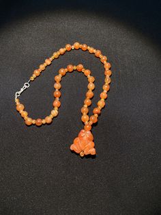 The beautiful necklace of ancient carnelian beads along with frog shape pendant we provide fast and free shipping service to our customer by which can get the items by maximum 7 working days Carnelian Orange Amulet Necklace, Orange Carnelian Amulet Necklace, Traditional Amber Carnelian Necklace, Carnelian Agate, Carnelian Beads, Banded Agate, Traditional Jewelry, Beautiful Necklace, Agate Beads