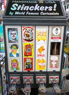 an old fashioned slot machine with pictures on it