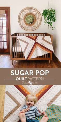 a baby is sitting on the floor in front of a crib with a quilt