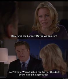 a woman talking to a man in a suit with the caption how far is the border maybe we can run?