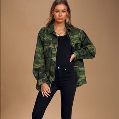 Excellent Condition Free People Seize The Day Military Jacket Size Xs Oversized Fit Sturdy Woven Cotton, Boasting A Classic Green And Black Camo Print, Shapes This Essential Utility Jacket With An Oversized Silhouette, And Long Sleeves With Button Cuffs. Collared Neckline Leads Into The Slouchy Zip-Front Bodice With An Additional Button Placket, Four Functional Flap Pockets, And A Hidden Drawstring Waist For A Custom Fit. Unlined. Shell: 100% Cotton Oversized Military Utility Jacket For Spring, Oversized Military Spring Outerwear, Long Sleeve Camouflage Outerwear For Spring, Oversized Military Outerwear For Spring, Oversized Camouflage Winter Outerwear, Oversized Camouflage Outerwear For Winter, Winter Camouflage Oversized Outerwear, Camouflage Outerwear With Pockets, Fall Camouflage Outerwear For Work