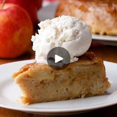 a piece of cake on a plate with ice cream and an apple in the background