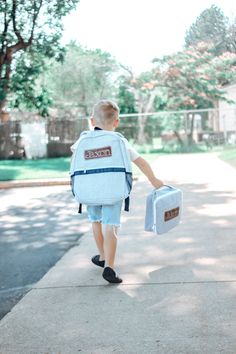 Our seersucker kids backpacks are not only adorable, but well made! They are lightweight and lined - perfect for kids! They feature a large exterior pocket on front as well as two exterior pockets. There is an additional large pocket inside for extra organization. Size: 16 x 13 x 3.5 Blue comes with faux leather name tag and name embroidered in white Pink comes with white seersucker name tag and name embroidered in pink If you prefer another style for the name or name tag, please send me a messa Pink Lunch Bag, Personalized Backpack Kids, Kids Lunch Bags, Backpack Lunch Bag, Personalized Backpack, Kids Backpack, 1st Day Of School, Pink Backpack, Kids Lunch