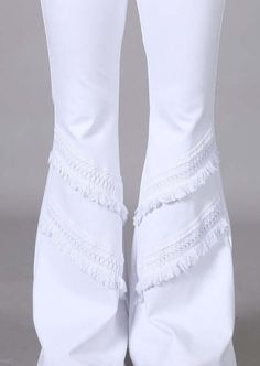 Proudly Made in USA Experience ultimate style and comfort with our Fit & Flare Fringe Pants Made in USA! These white pants feature crochet and fringe accents, adding a touch of boho-chic to your wardrobe. The flattering mid-rise and slimming fit will have you feeling confident, while the flare style and bell bottom design make a statement. Perfect for any occasion, these pants will have you looking and feeling your best in bright white. White Flare Pants with Fringe Detail Mid Rise Crochet & Fri Pants With Fringe, White Flare Pants, Fringe Pants, Casual Denim Jeans, Boho Brand, White Flares, Plus Size Fall, Crochet Fringe, Bottom Design