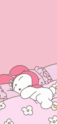 a hello kitty laying on top of a bed with pink sheets and white daisies