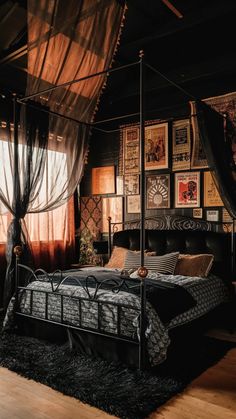 a bedroom with a canopy bed and pictures on the wall