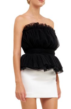 Wispy tulle and soft texture marry on this shoulder-baring top designed with a banded waist and a flouncy peplum. Back zip closure Strapless Lined 100% polyester Hand wash, dry flat Imported Glamorous Evening Tops With Ruffles, Fitted Organza Tops For Evening, Chic Off-shoulder Top For Wedding, Spring Evening Peplum Top, Fitted Tulle Top For Party, Tulle Top With Ruffles For Party, Chic Fitted Tulle Top, Elegant Sleeveless Organza Top, Party Tops With Ruffles And Tulle Material