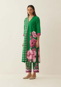 Editor's Note This green cotton kurta and pant set is a charming and playful choice for any casual occasion. The kurta features a gingham check pattern in a bright green colour, adding a touch of classic style to the ensemble. The design is mixed with a beautiful floral pattern, creating a fun and whimsical look. Color: Green Fabric: Giza cotton Components: Kurta and pant Fit: Relaxed Occasion: Casual Care: Dry Clean Only About the Designer Shivani Bhargava defines itself in three words Pure, Na Easy Clothing, Blouse Yoke, Kurta Pant Set, Kurta With Pants, Gingham Check, Eco Friendly Fabric, Giza, Pant Set, Green Fabric