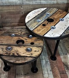 two tables made out of pallet wood with metal knobs on the top and bottom